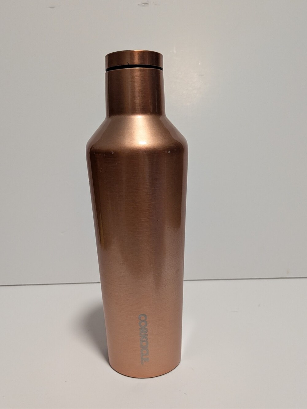 Corkcicle metallic rose gold Canteen featuring a triple-insulated stainless 16o